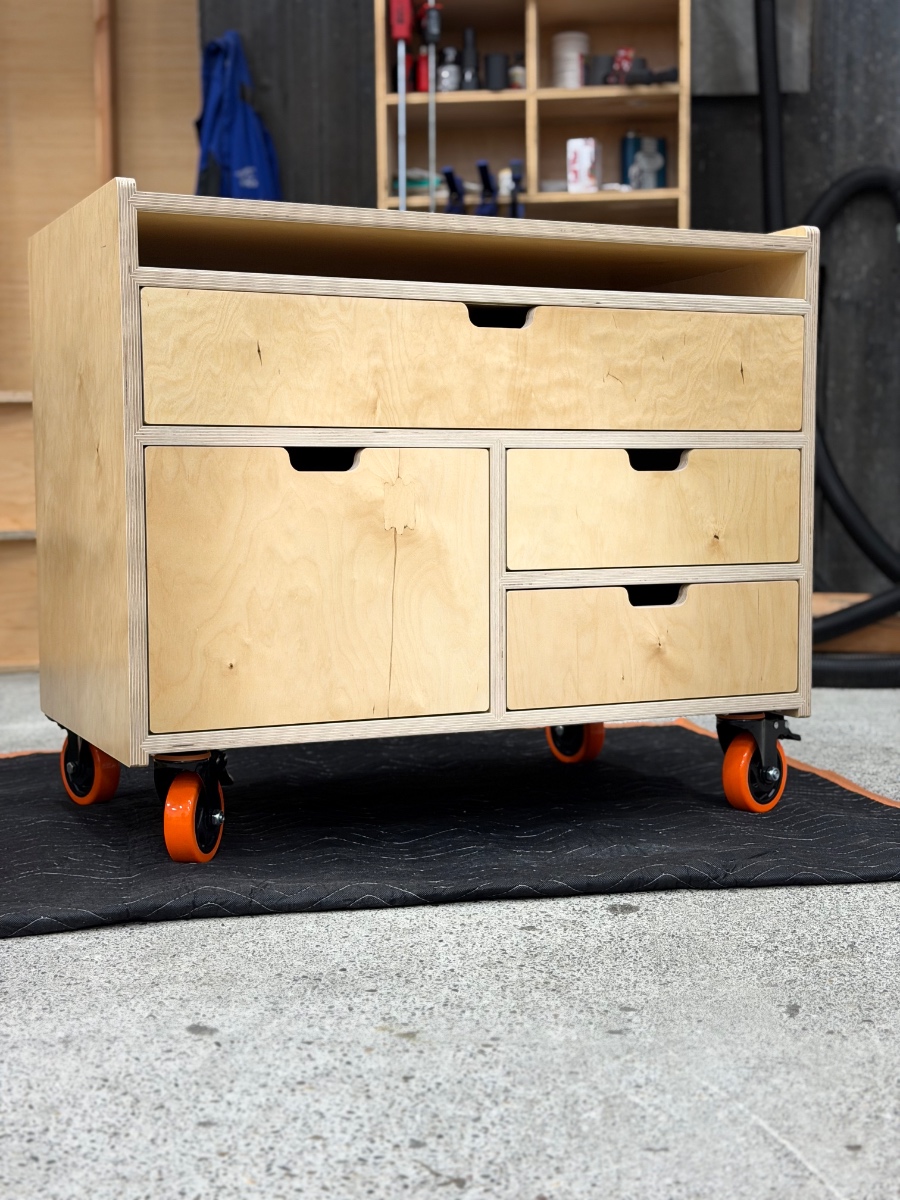 A heavy duty printer table on wheels