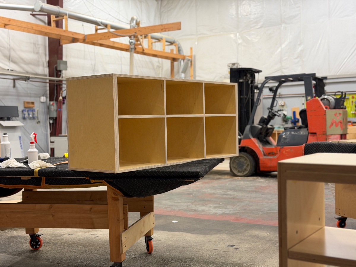 Low wood foot locker storage chest sized for the foot of a bed