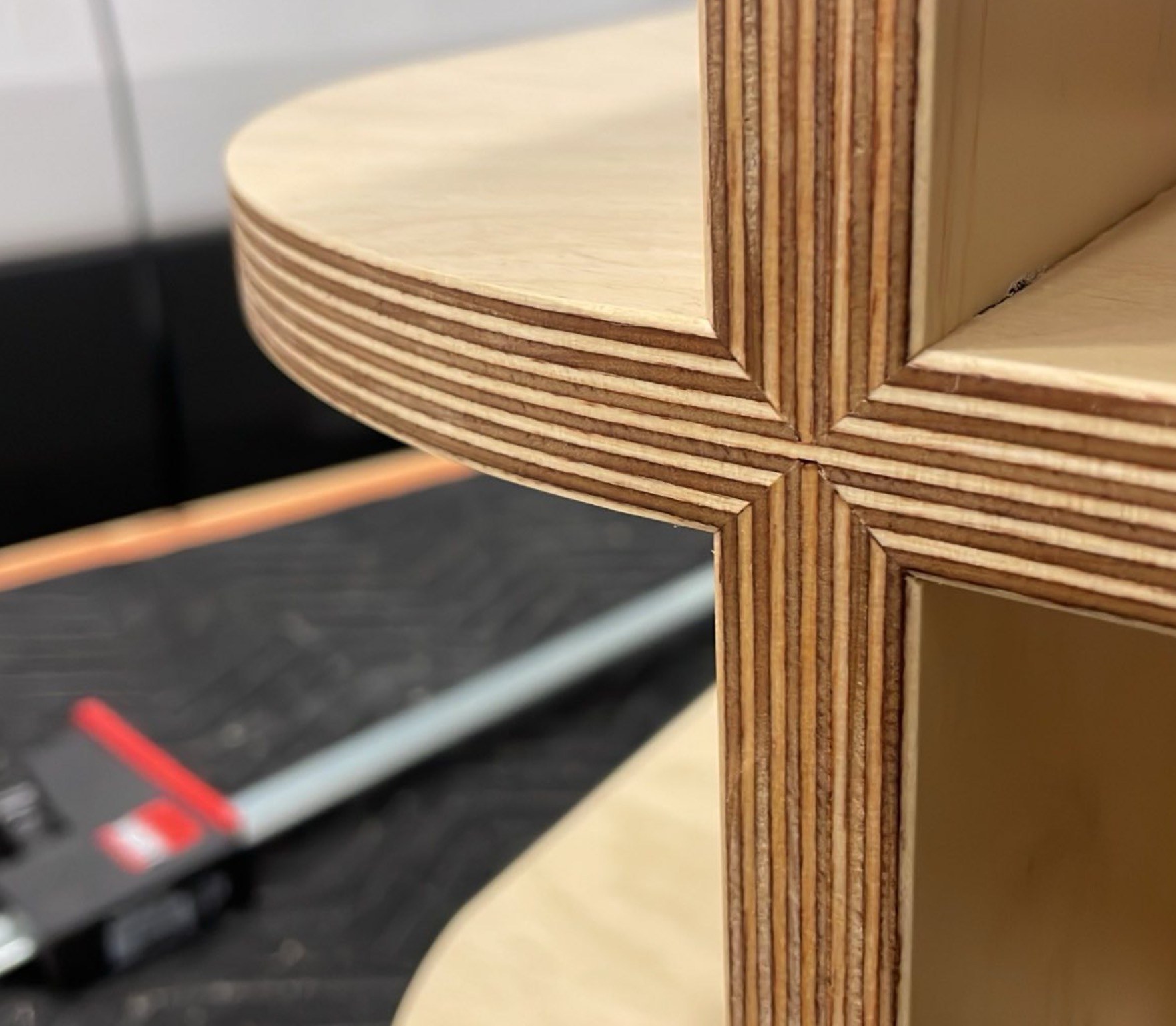 Close-up of a tight front mitre joint on wood furniture