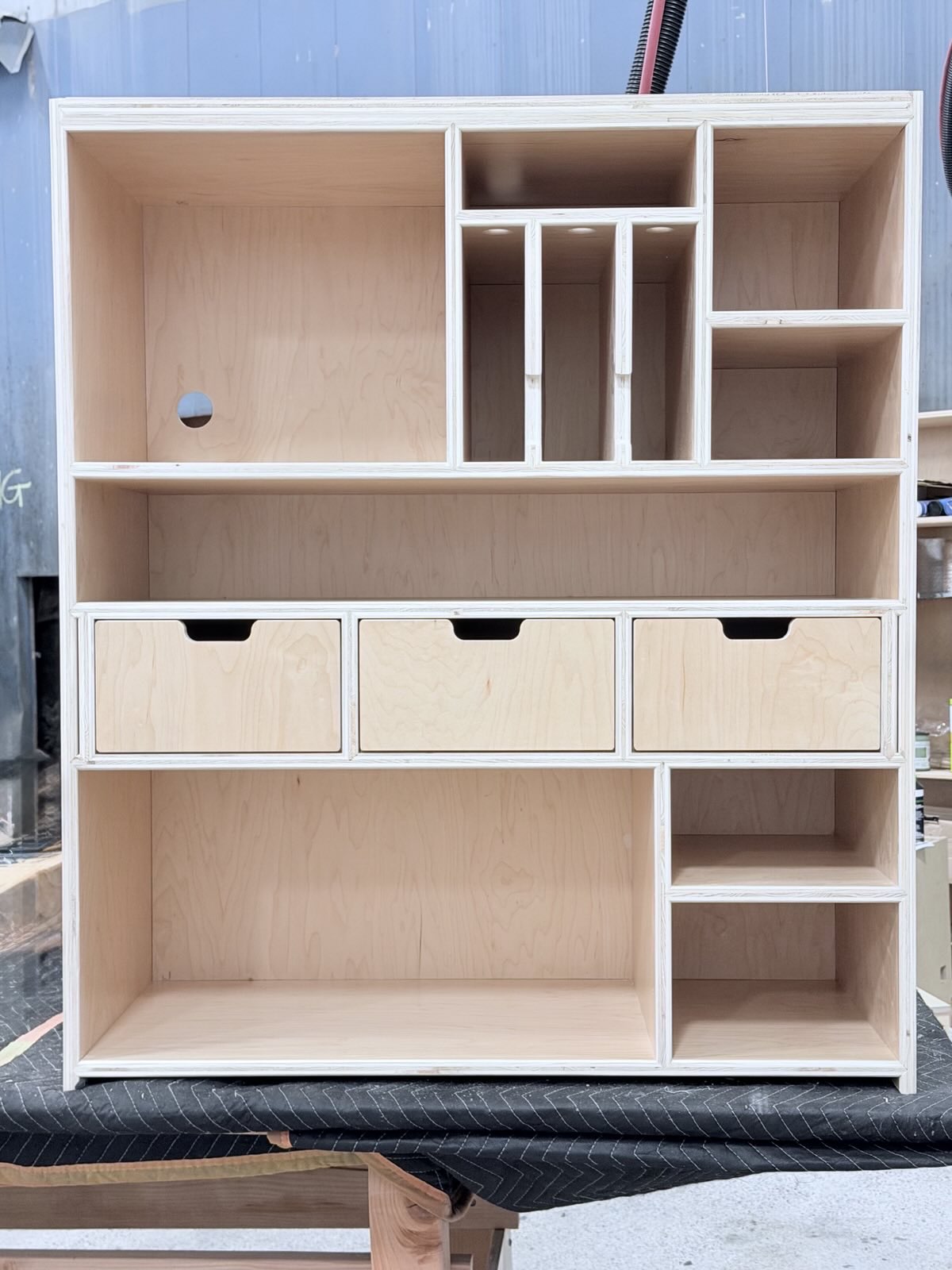 Electronics caddy and office supply storage for a home office